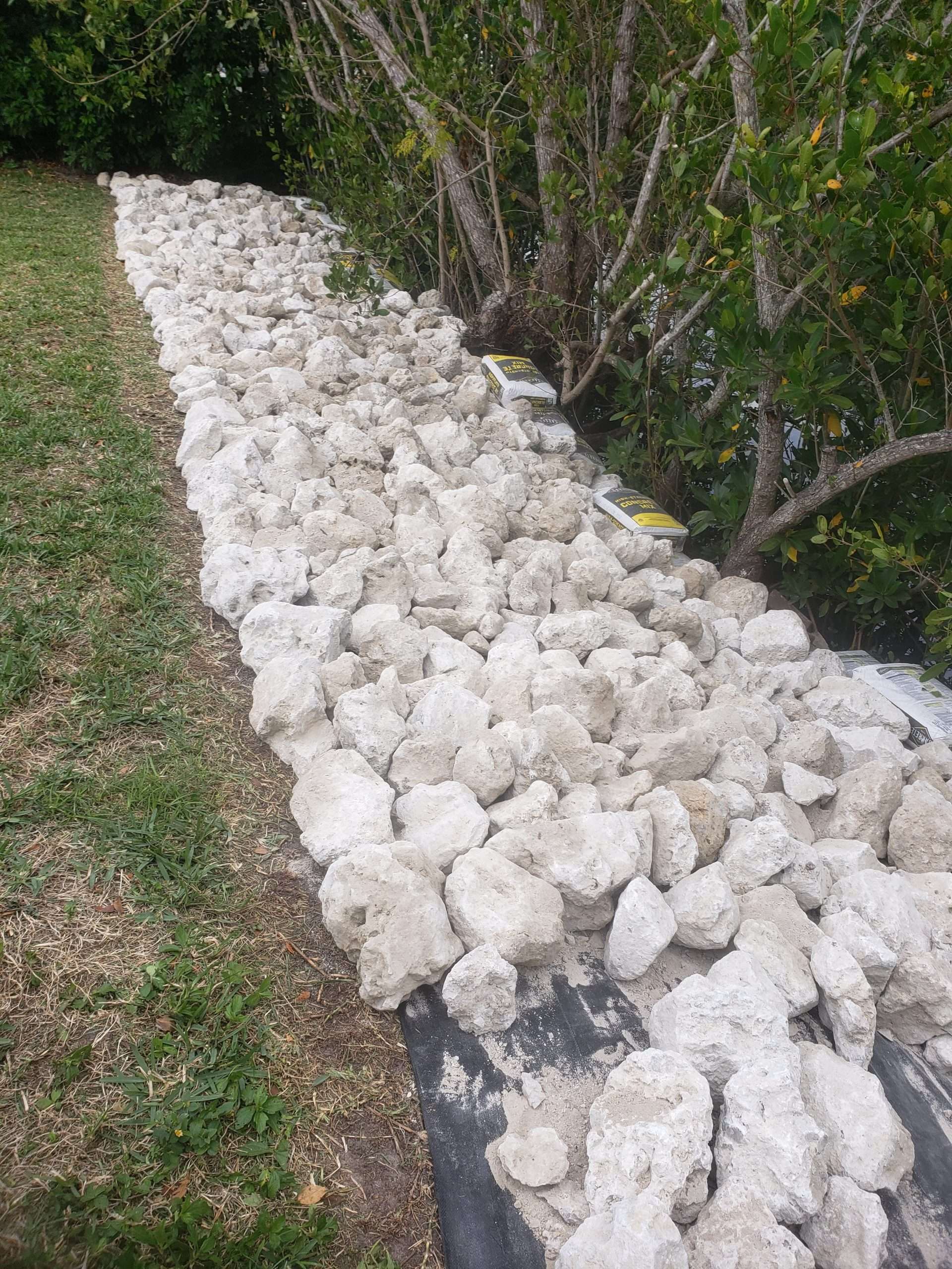 Variety of landscape supplies including mulch, rock, and soil in Port Charlotte