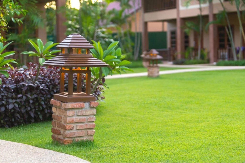 Landscape lighting highlighting a Florida home's front yard