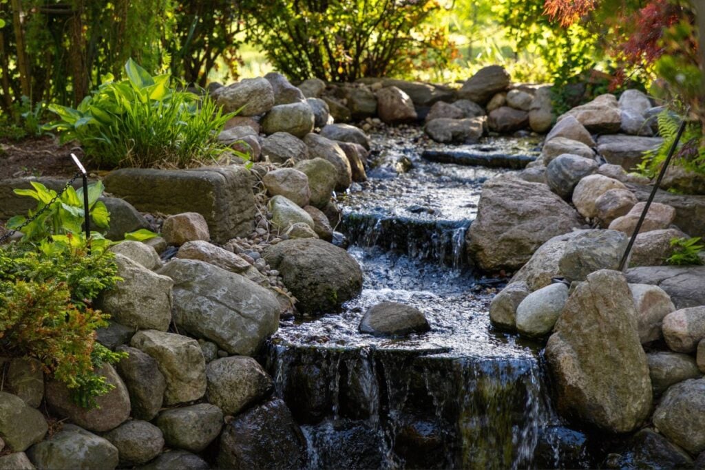 Landscape stone used for drainage around a Florida property