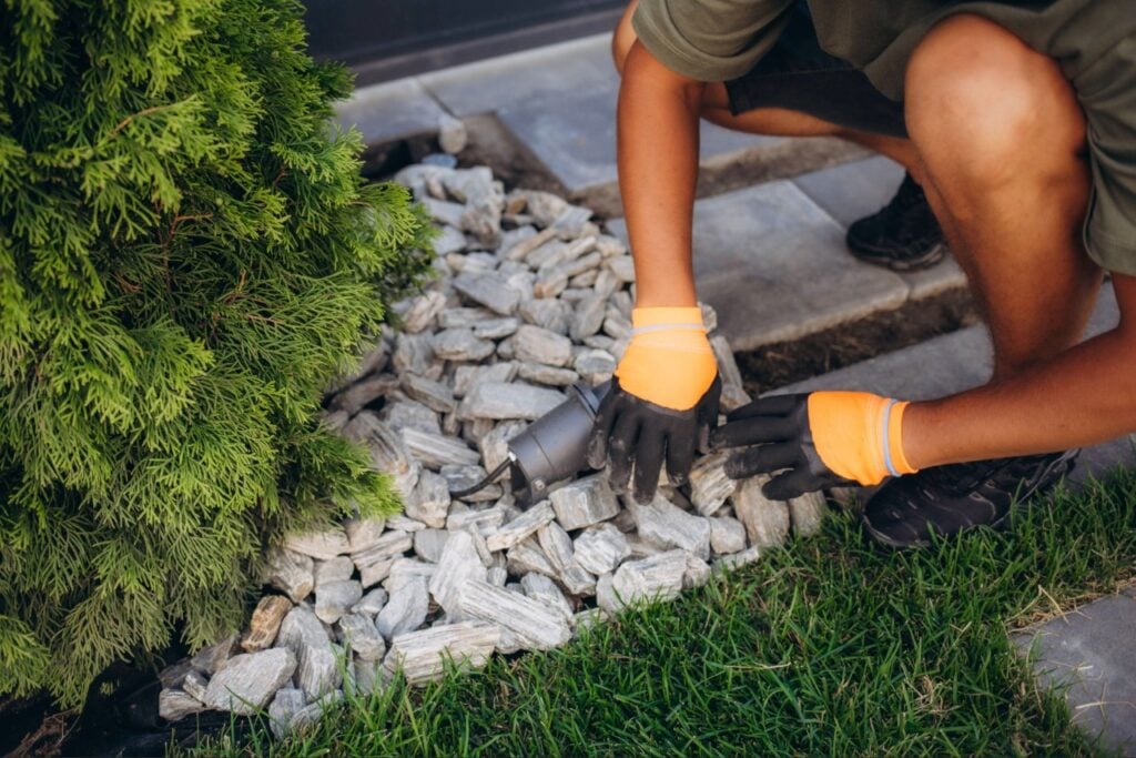 Maintaining landscape stone around Florida planting beds